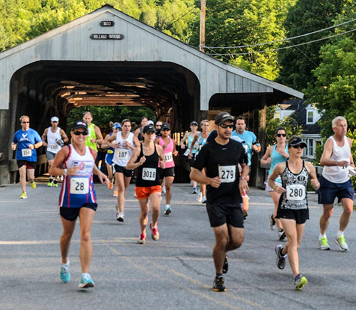 Mad Marathoners crossing the Waitsfield covered bridge. Photo: Rhoady Green