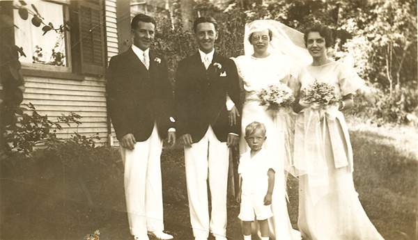 Allen Mehuron at 2 years old at his Aunt Ruth's July wedding in 1934. He is pictured with groom Jimmy McGill and bride Ruth Mehuron.