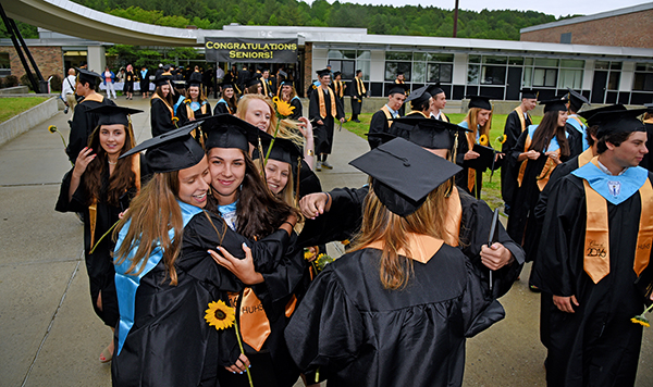 Harwood graduates celebrate the end of school. Photo: Gordon Miller