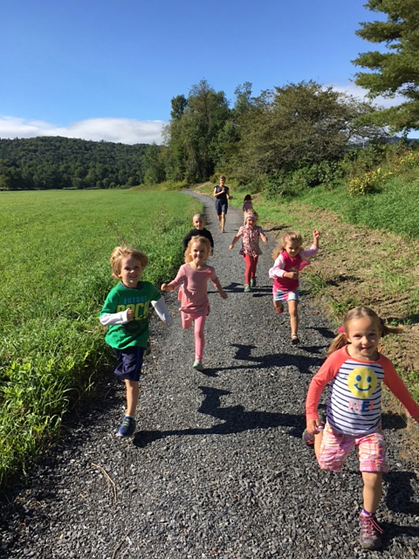 School children enjoy the new "Waits Way" section of the Mad River Path behind the Waitsfield Elementary School.