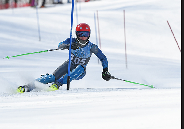 The Harwood Union boys’ alpine team claimed the state championship bragging rights on March 6 and 7 at the Middlebury Snow Bowl. Above: Taylor Austin in the March 6 slalom. Austin, along with Noah Williams and Rex Rubenstein, will compete in the Easterns in New Hampshire this coming weekend. Photo: John Williams