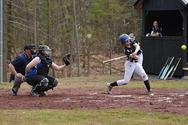 Harwood catcher, Cheyenne Martindale, hits a single against Thetford on April 27. Photo: Chris Keating