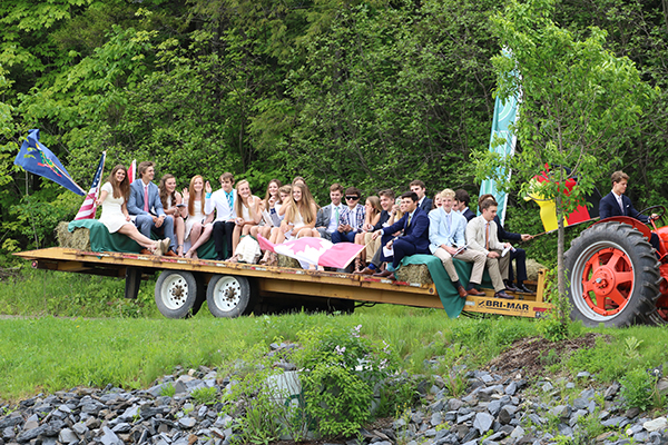 Green Mountain Valley School students ride into graduation.