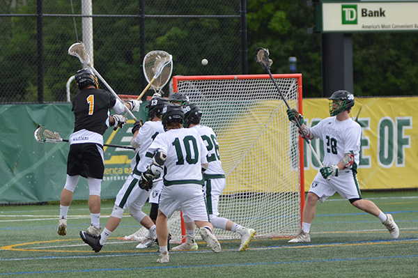 Harwood's Noah Williams (No.1) scores one of Harwood's goals during their championship game against Stowe. Stowe won 13-10. Photo: Chris Keating
