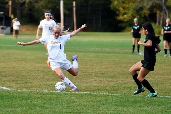 Harwood's Kate McMann takes a shot in Harwood's 2-0 win over Stowe on Wednesday, September 27. Photo: Chris Keating