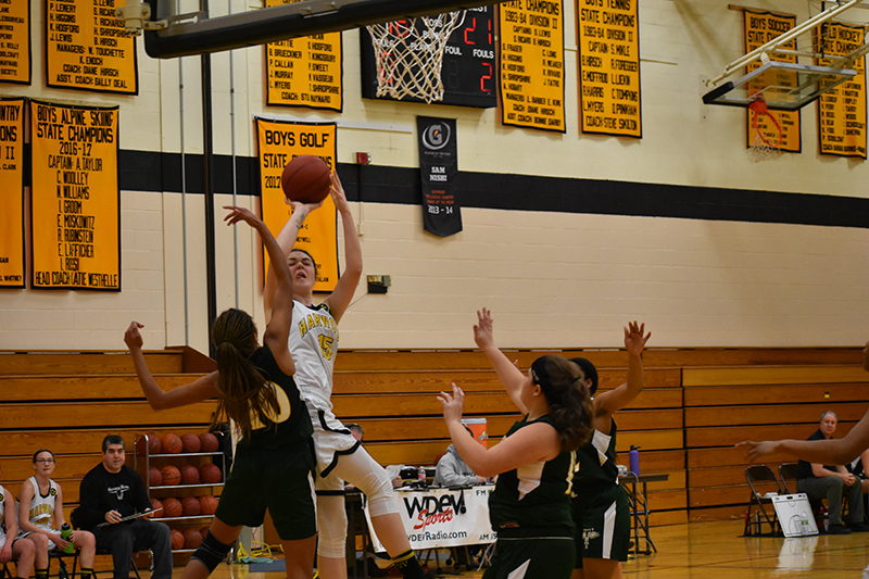 Harwood's Mia Cooper takes a shot. Cooper scored 13 against Montpelier. Photo: Tom Young