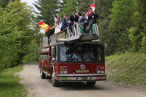 GMVS graduates ushered to commencement atop the Warren Fire Department’s ladder truck.