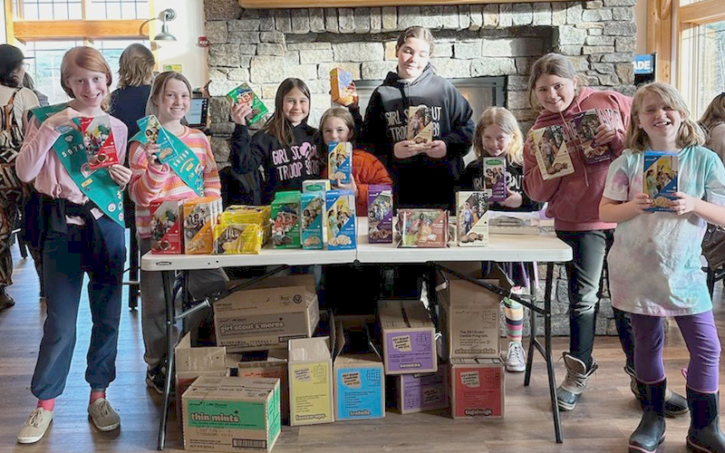 Members of The Valley Girl Scouts troop -- Waitsfield, Warren and Fayston -- sell Girl Scout cookies at Lawson’s Finest. Photo: Crystal Lund.