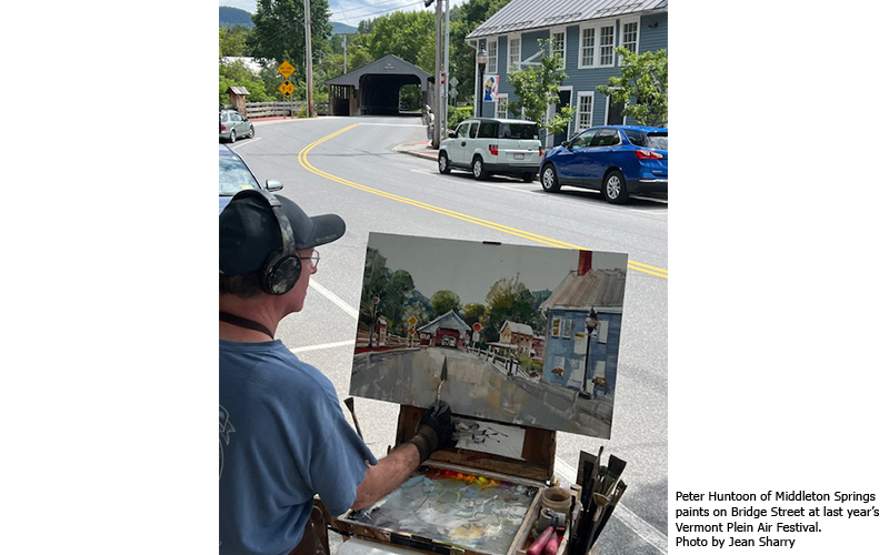 Peter Huntoon of Middleton Springs paints on Bridge Street at last year’s Vermont Plein Air Festival. Photo by Jean Sharry