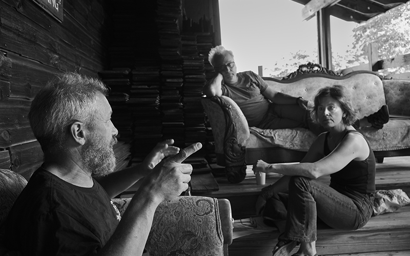 Ben Schneider, David Sinaiko and Jeanne Darst (l to r) take a break on the Phantom porch as they rehearse their upcoming comedy "Blow Me Down." Photo: Peter Hastings