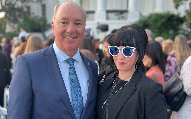 Former Burlington police chief Tom Tremblay, left, and Anna Nasset, Waitsfield, were invited to the White House by President Biden for the celebration of the 30th anniversary of the passing of the Violence Against Women Act.