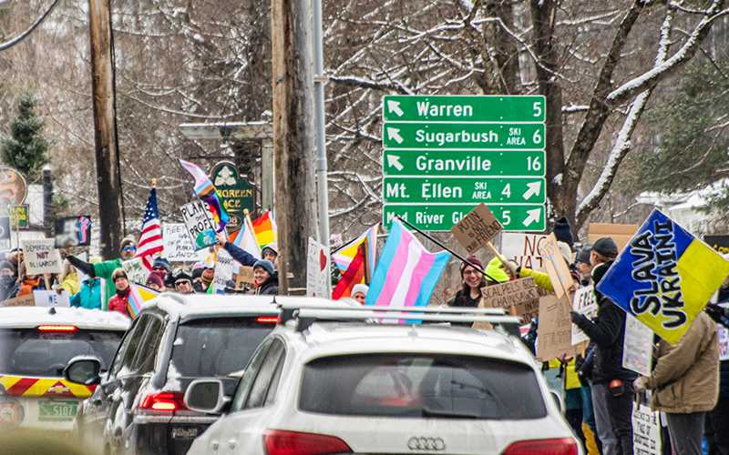 Protesters lined Main Street in Waitsfield near the intersection of Routes 100 & 17 on Saturday morning March 1 in response to Vice President JD Vance's visit to the Mad River Valley. Photo: Jeff Knight