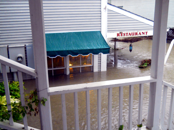 Lights still on as floodwaters inundate Waitsfield buildings during Tropical Storm Irene